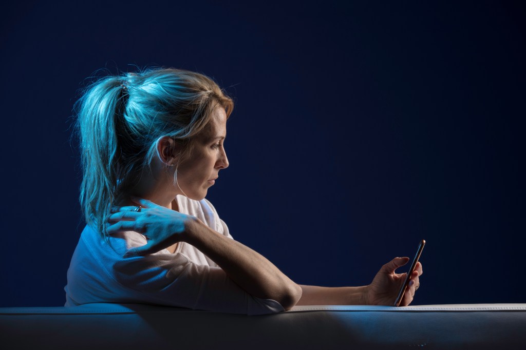Woman who uses her smartphone
